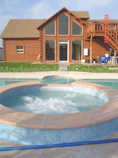 Alberca con jacuzzi y cabaña